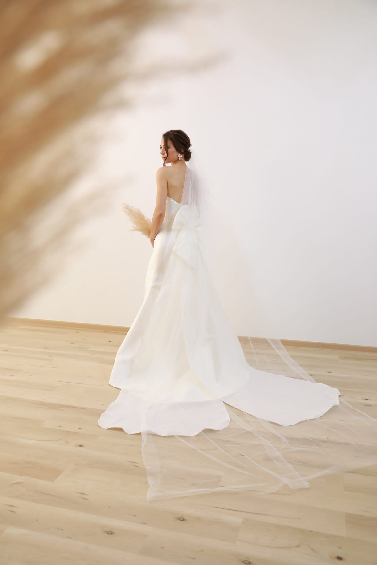 Bride in an affordable wedding gown rental dress