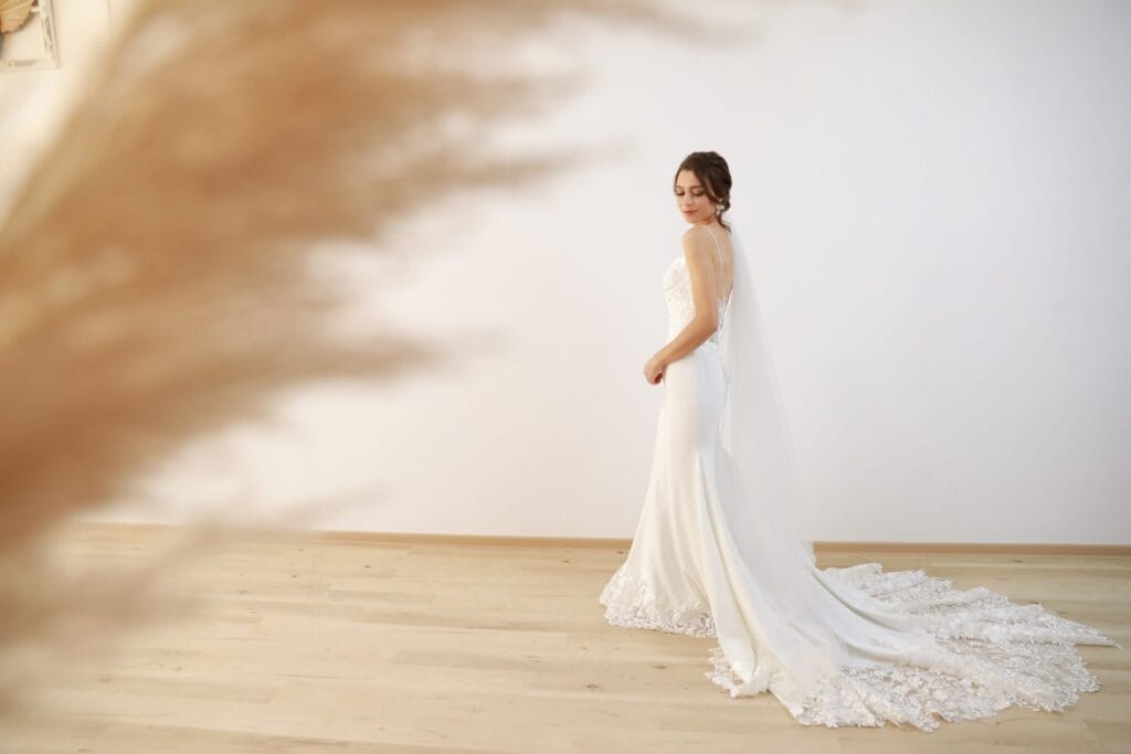 Bride in an affordable wedding gown rental dress