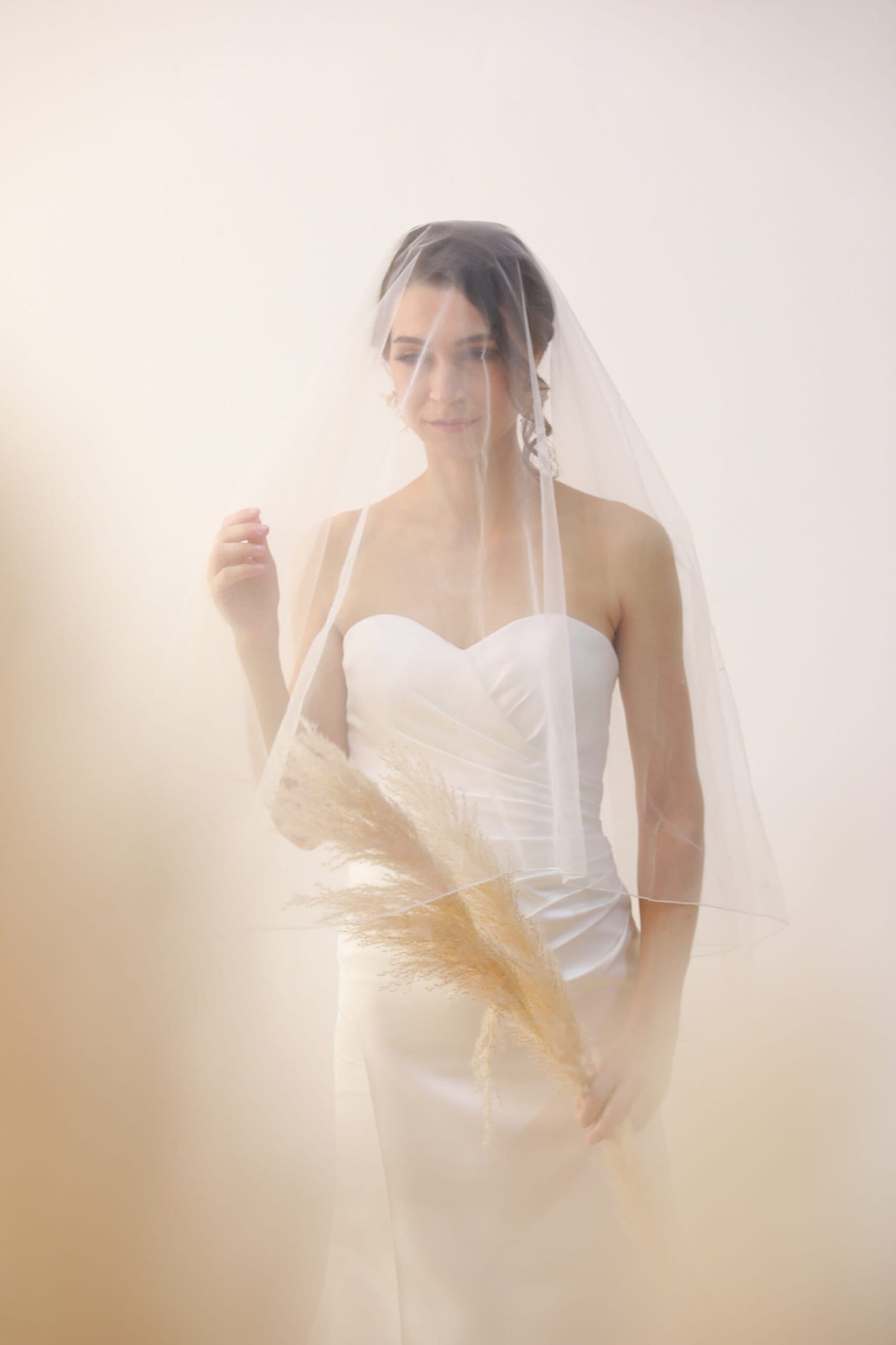 Bride in an affordable wedding gown rental dress