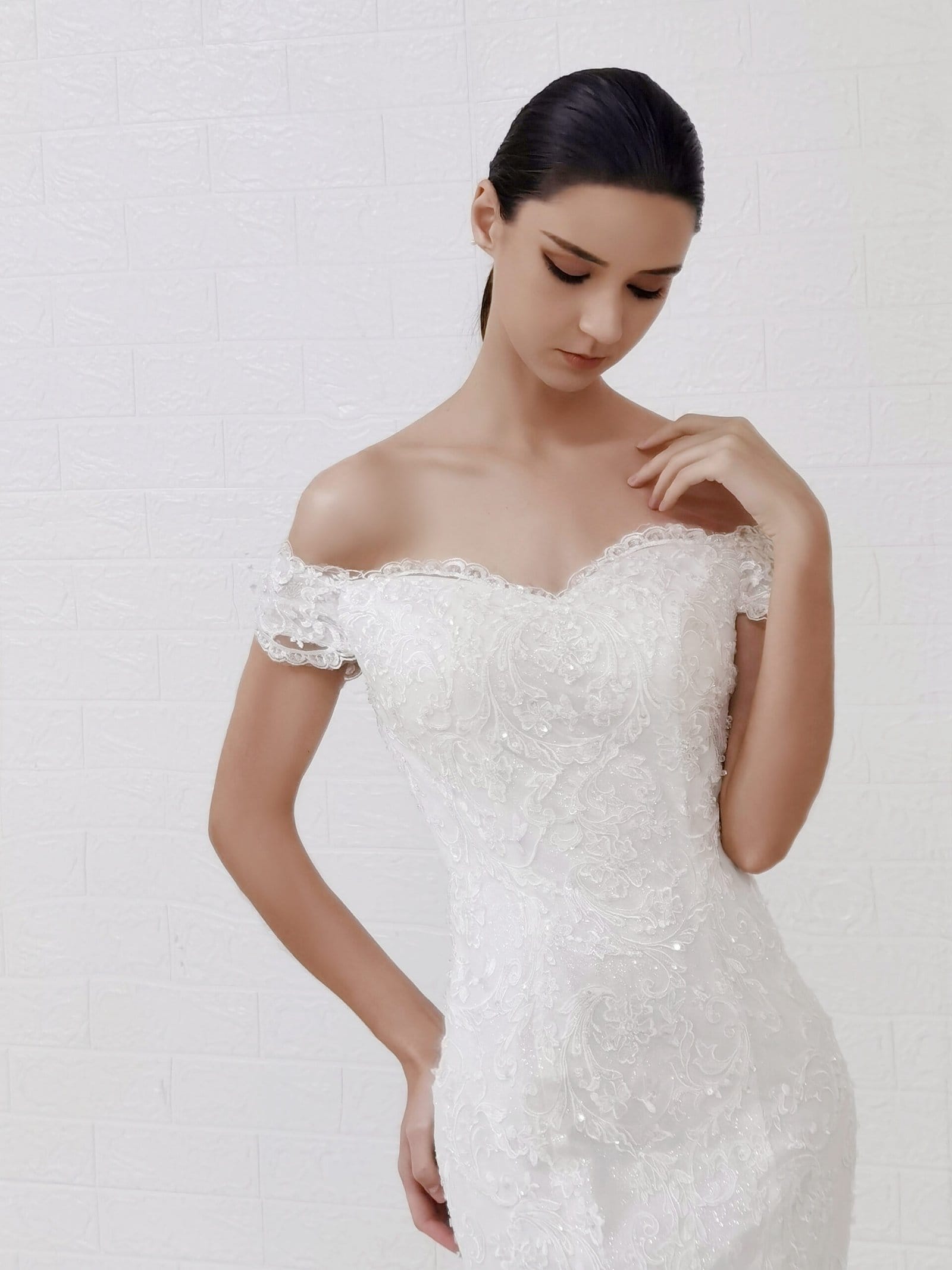 Bride in an affordable wedding gown rental dress